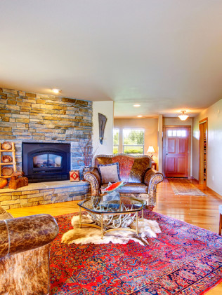 Living Room with Cozy Stone Fireplace Surround